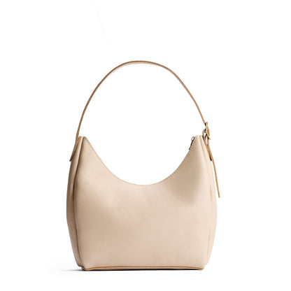 Pebbled Bone*Medium | U-shaped, flat-bottomed leather shoulder bag with adjustable strap