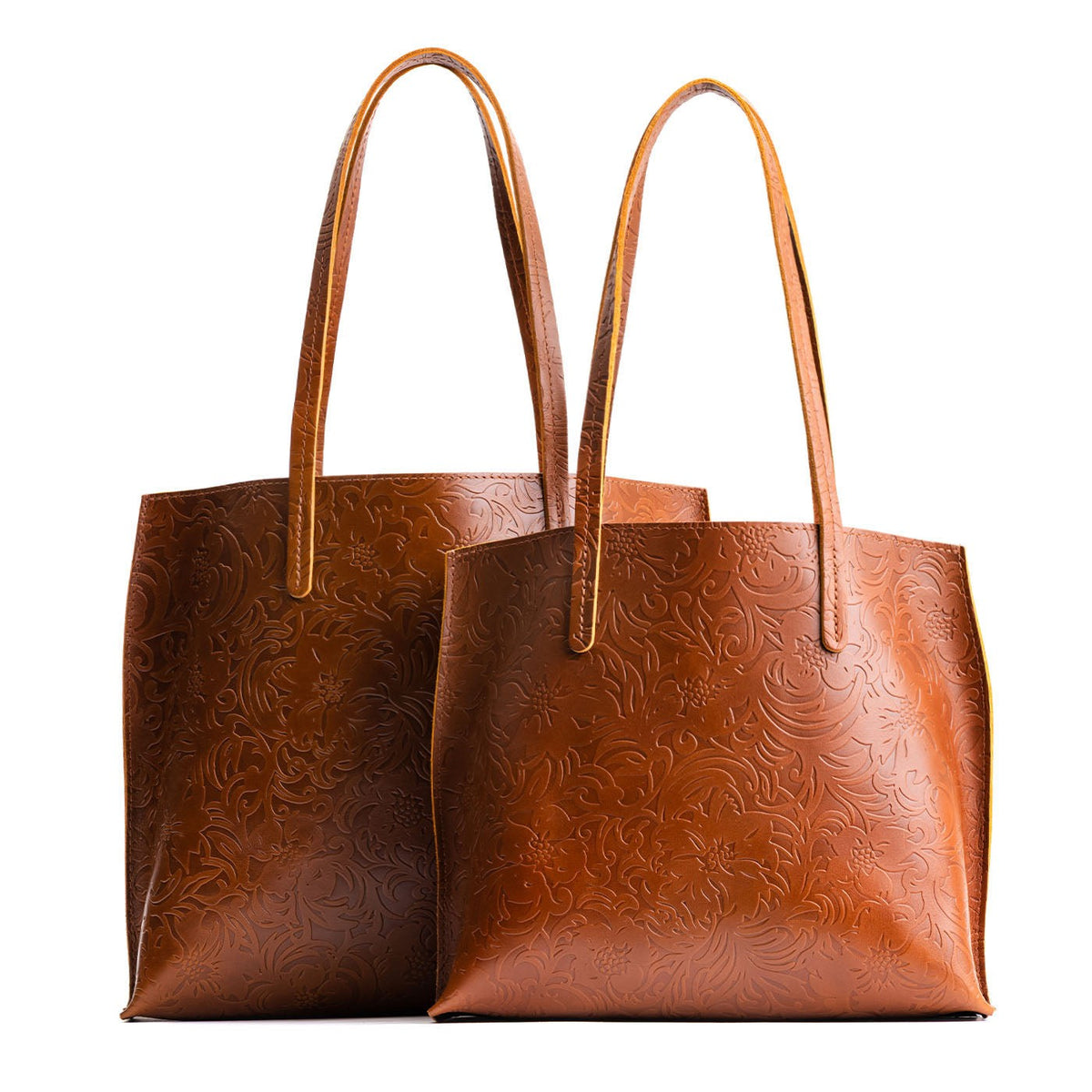 Meadow | Side by side comparison of both sizes of leather tote