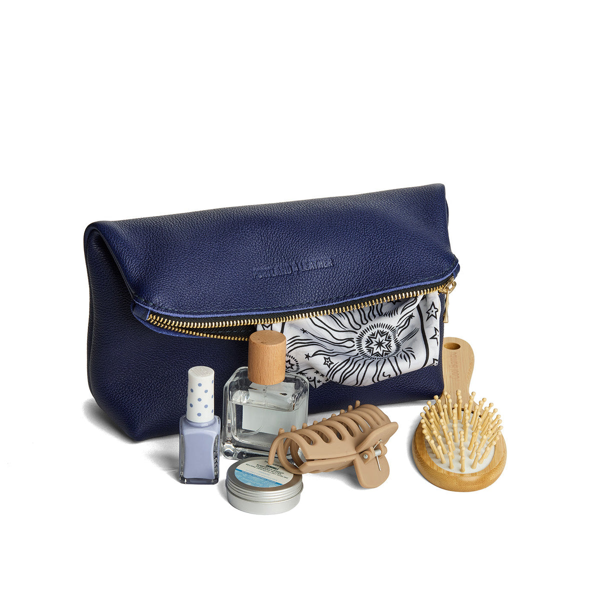 Cobalt | Closed folded zipper pouch with items