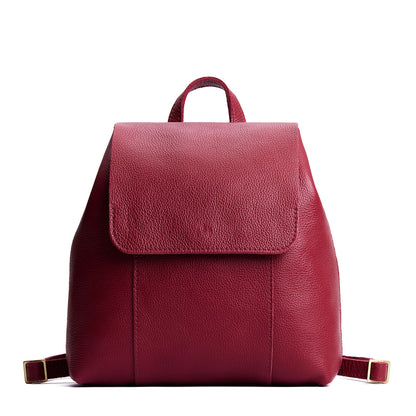 Rhubarb | Leather backpack with magnetic flap closure on a white background