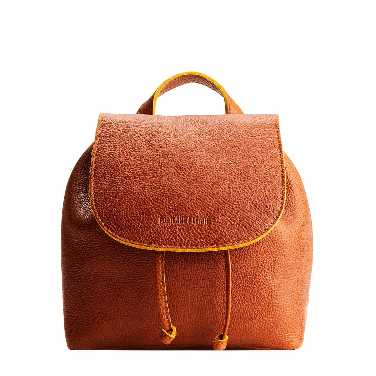 Sienna | Drawstring bucket backpack with snap closure under flap