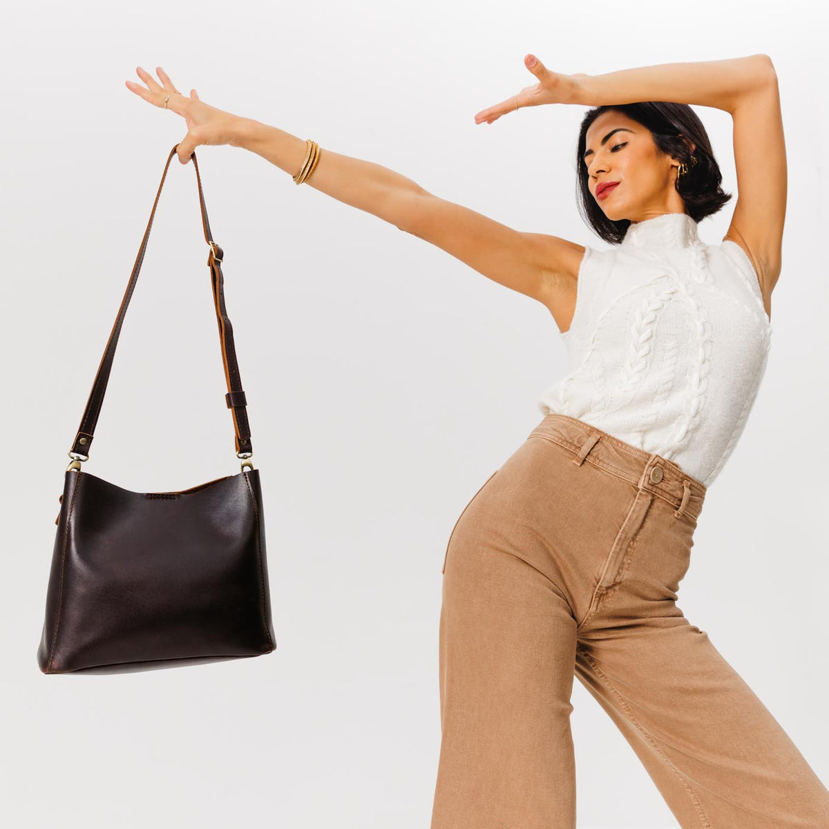 Grizzly | symmetrical bucket bag with latch closure and removable crossbody strap