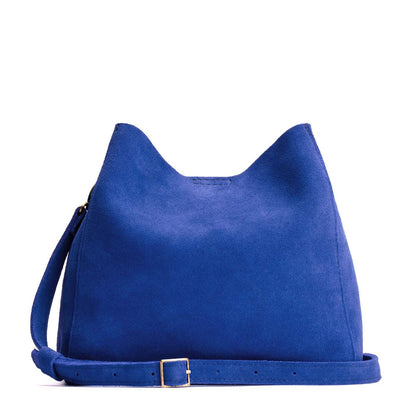 Joni Blue | symmetrical bucket bag with latch closure and removable crossbody strap