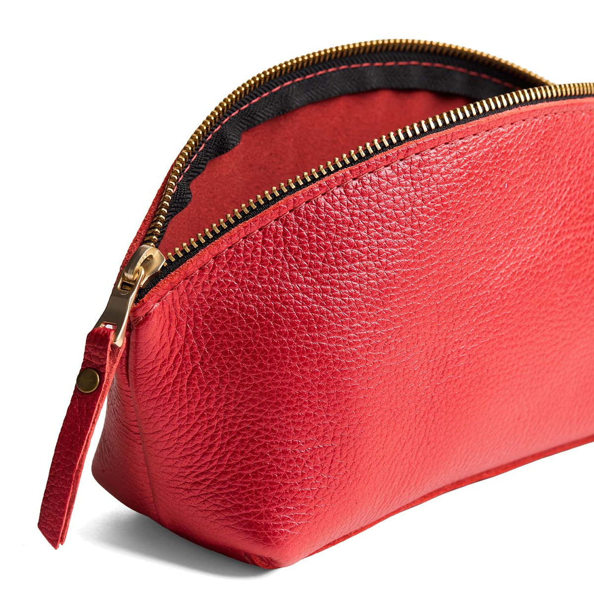 Reba Red | Spacious leather makeup bag with curved seams and top zipper