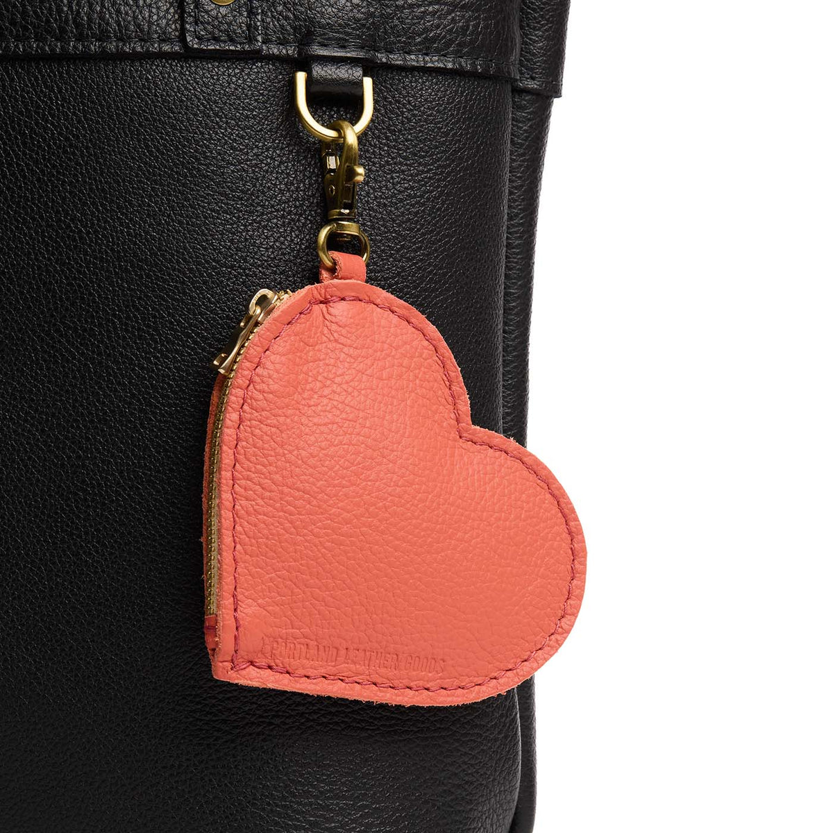 Coral | Heart-shaped leather pouch keychain with zipper top and lobster clasp