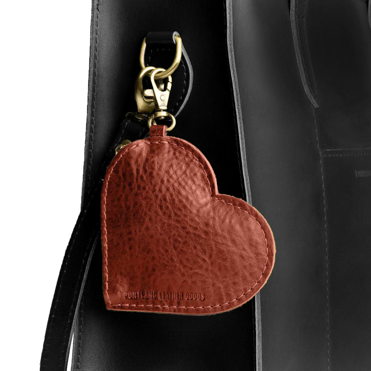 Nutmeg | Heart-shaped leather pouch keychain with zipper top and lobster clasp