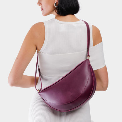 Lollipop*Large | Model wearing half circle shaped sling bag