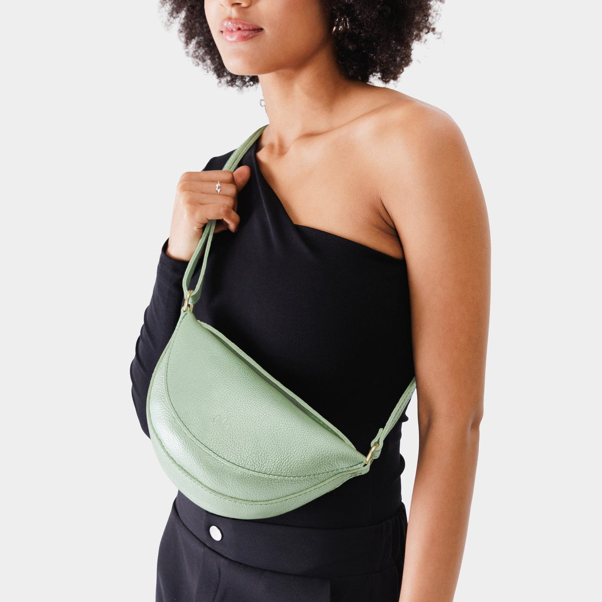 Beetle*Small | Model wearing half circle shaped sling bag