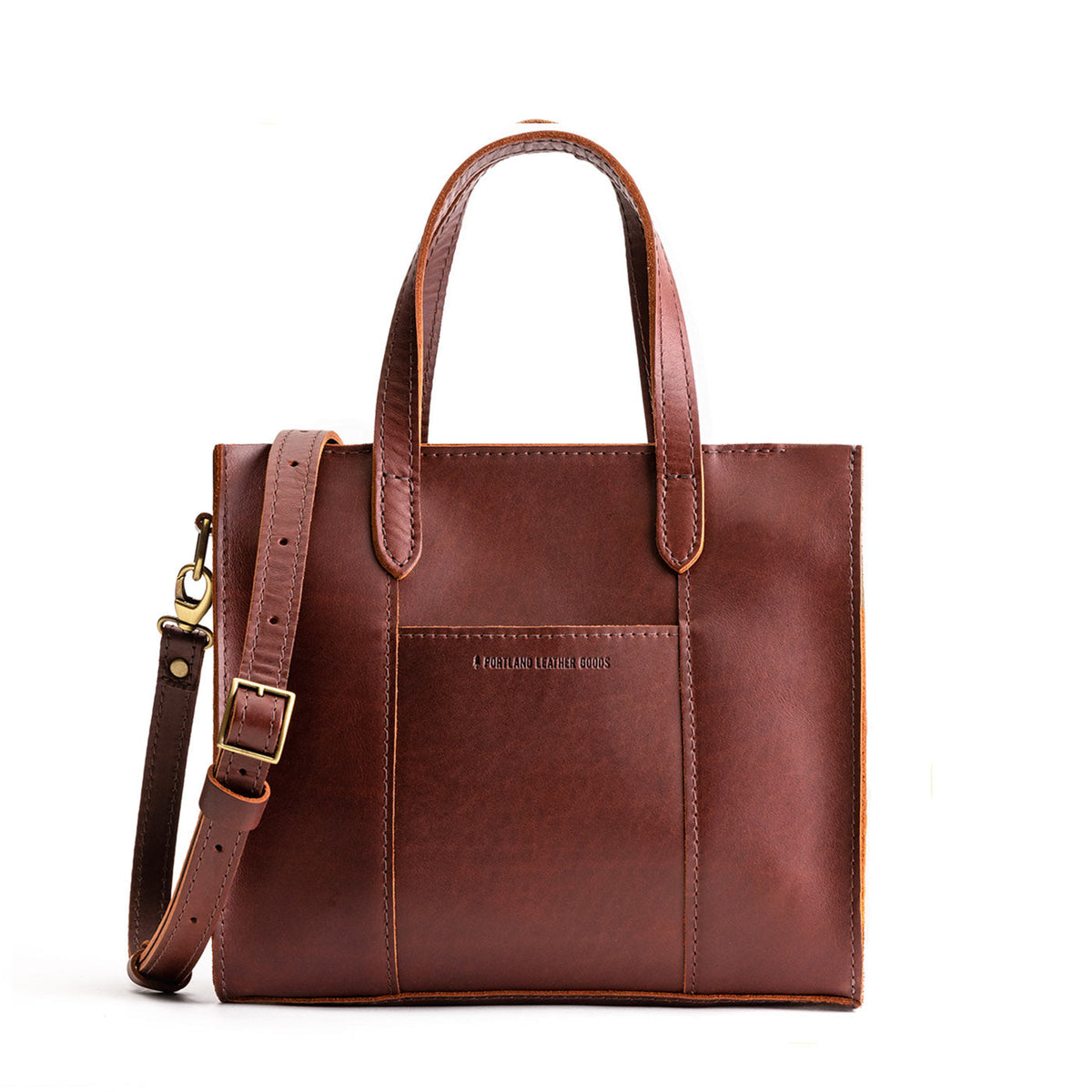 Cognac*Zipper | Structured mid-size tote bag with overlapping panels and crossbody strap