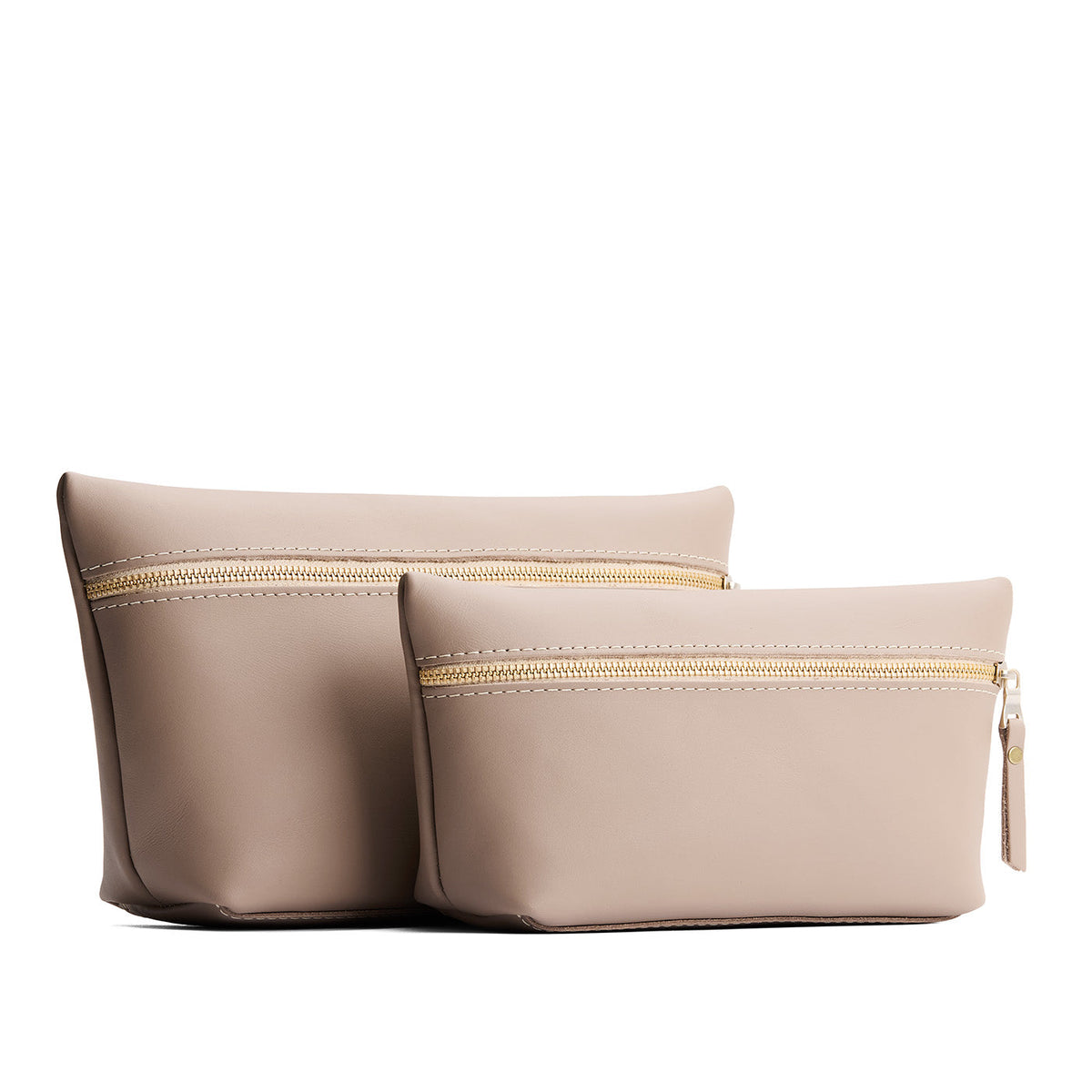 Stone | Two large leather makeup bags with zipper
