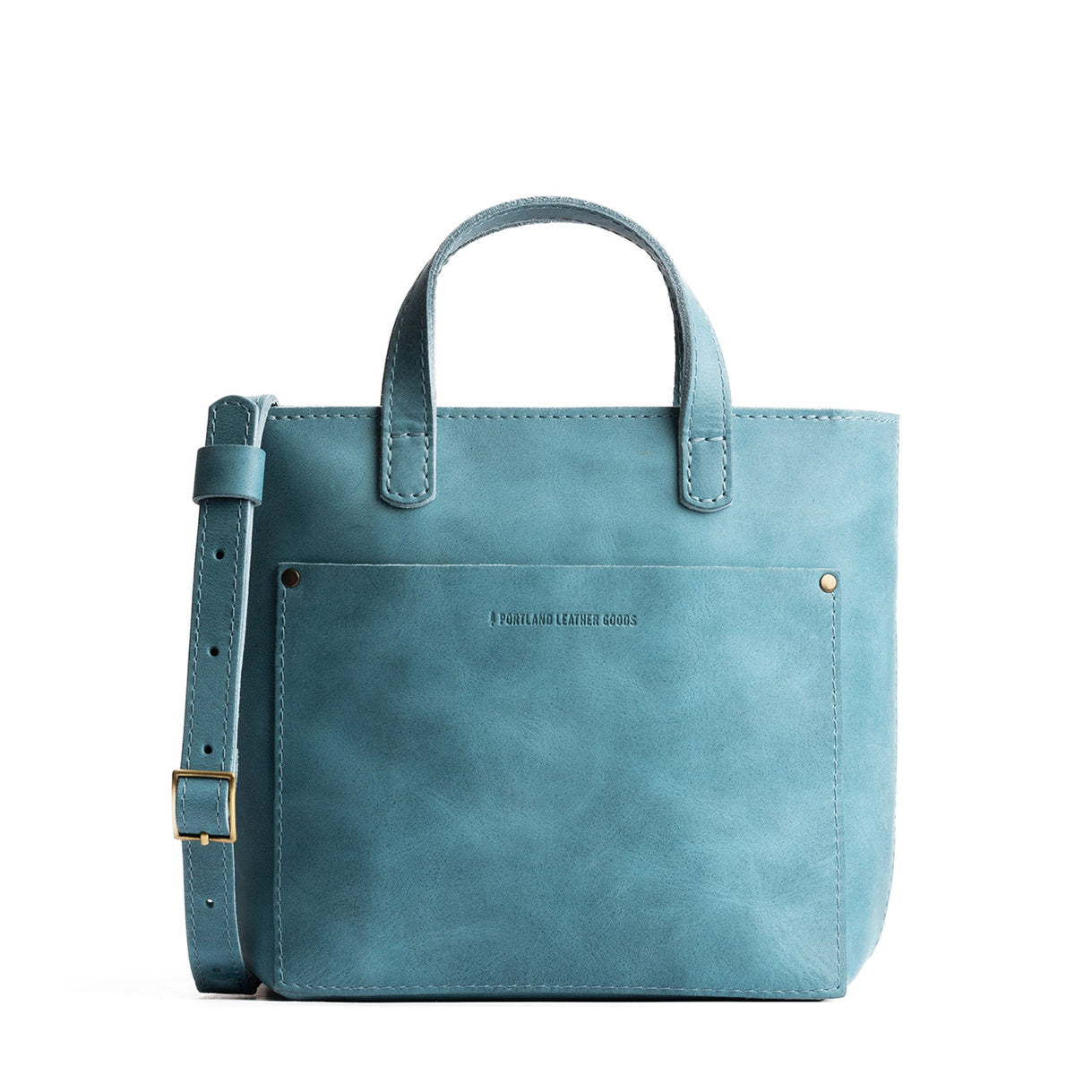 Aqua*Zipper | Crossbody tote bag with snap closure and front pocket