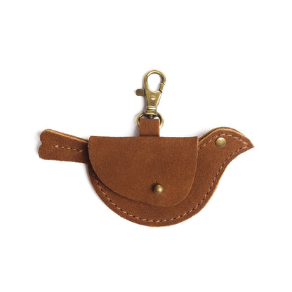 Jackson | Bird shaped pouch with button closure and lobster clasp