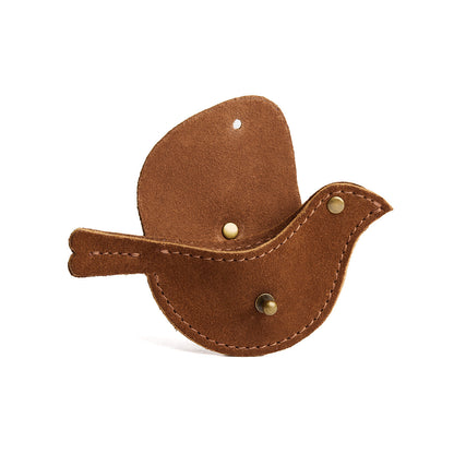 Jackson | Bird shaped pouch with button closure and lobster clasp