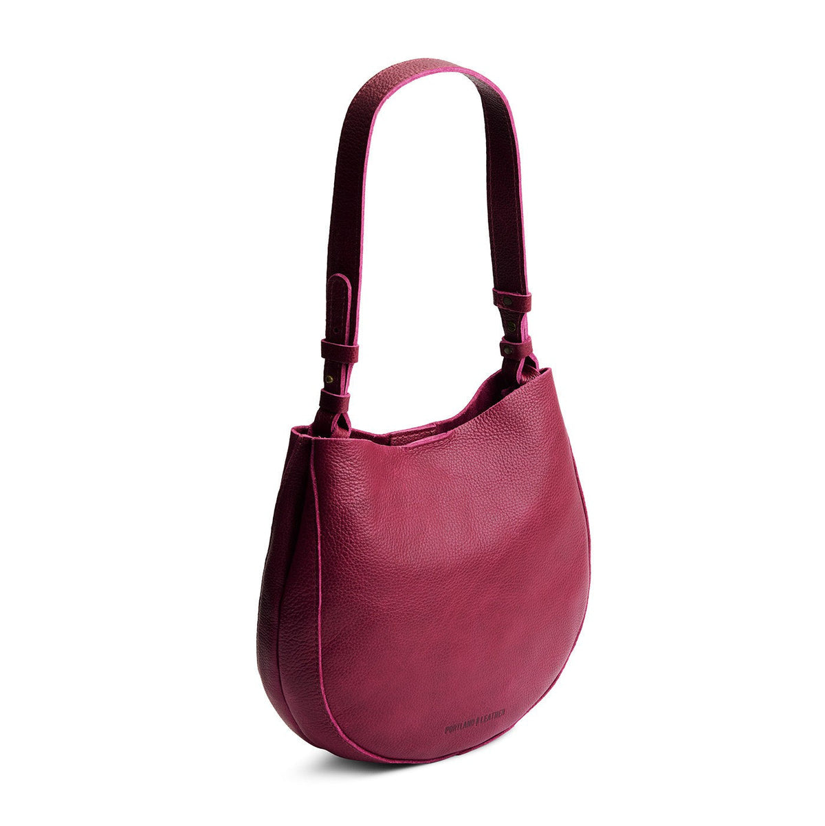 Orchid*Medium | Rounded shoulder bag with adjustable strap on a white background