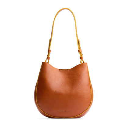 Sienna*Medium | Rounded shoulder bag with adjustable strap on a white background