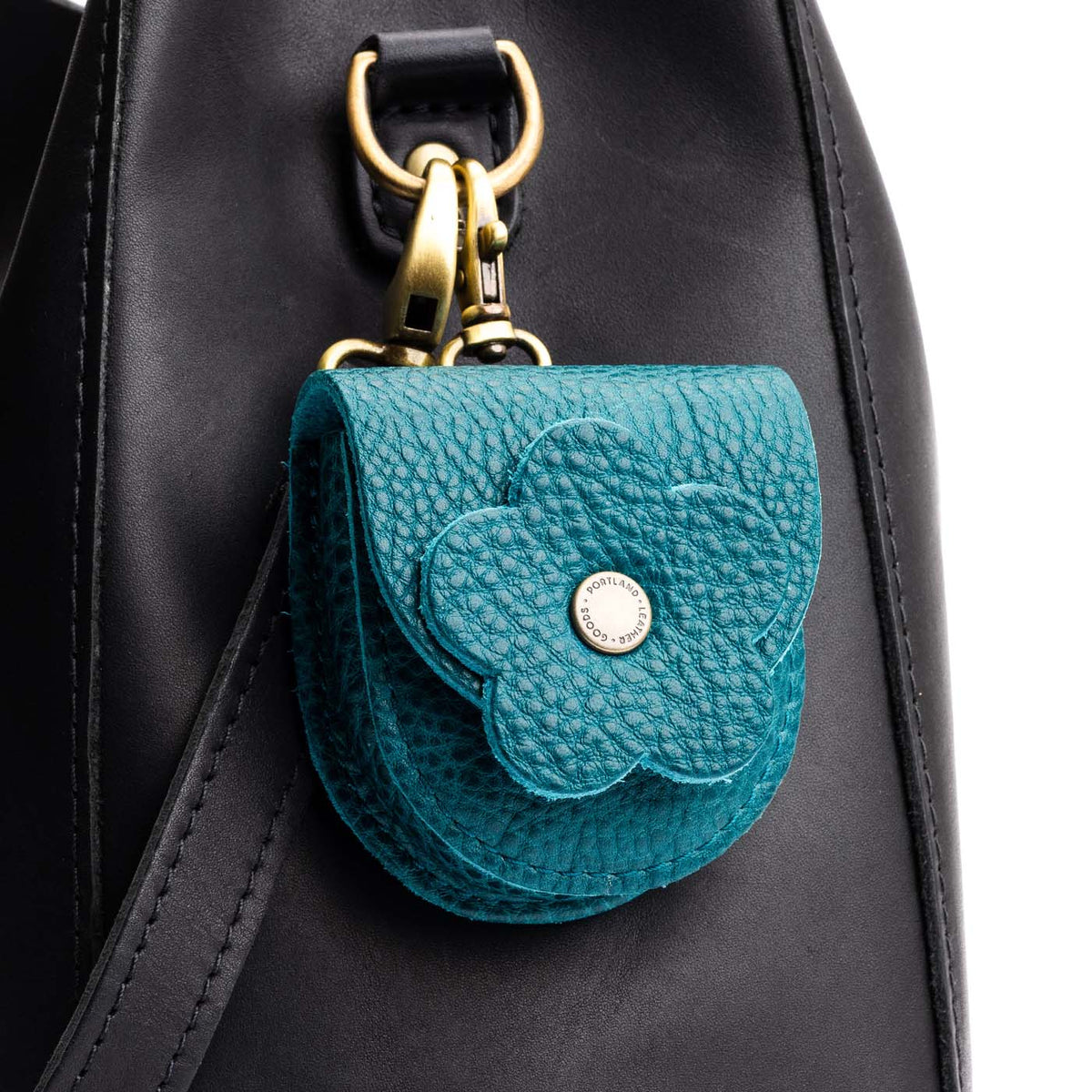 Aquarius | U shaped pouch with leather flower applique