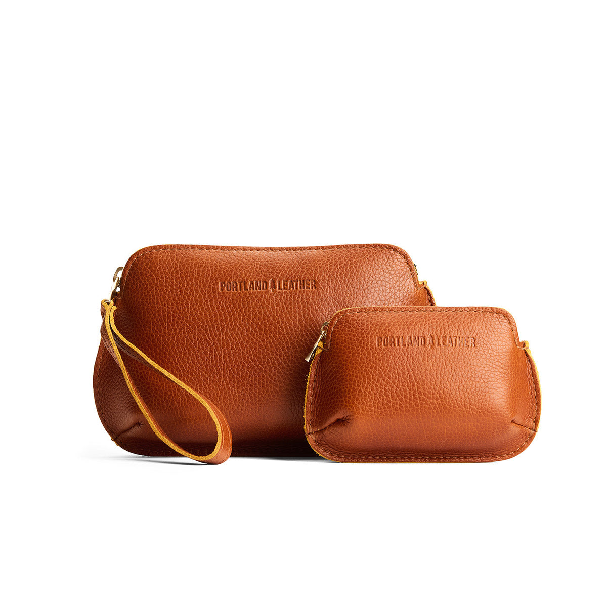 Sienna | Small and large pouch with top zipper and curved edges