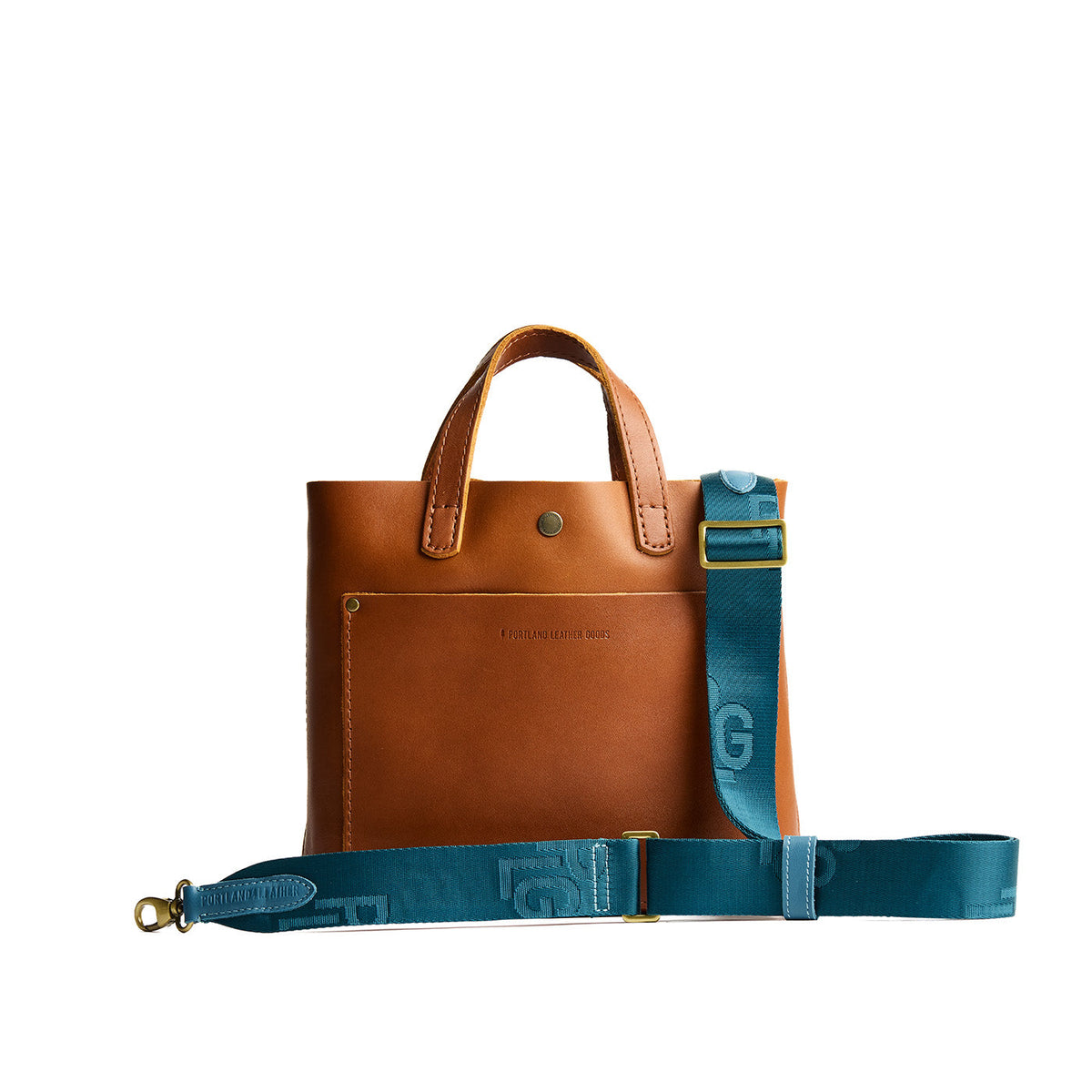 Blue Lagoon | Blue strap with repeating PLG letter pattern and brass-toned hardware