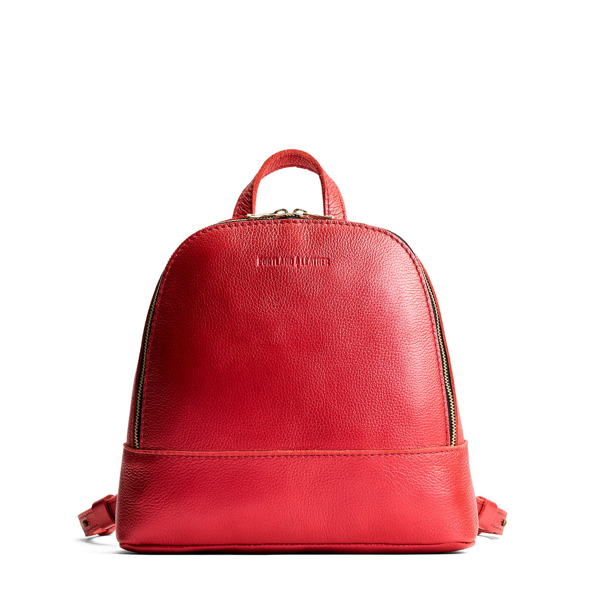 Reba Red | Leather backpack with debossed Portland Leather logo on front, with zipper closure and straps with lobster clasps