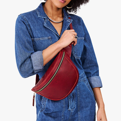 Chili Red | Model wearing a sling bag with front zipper