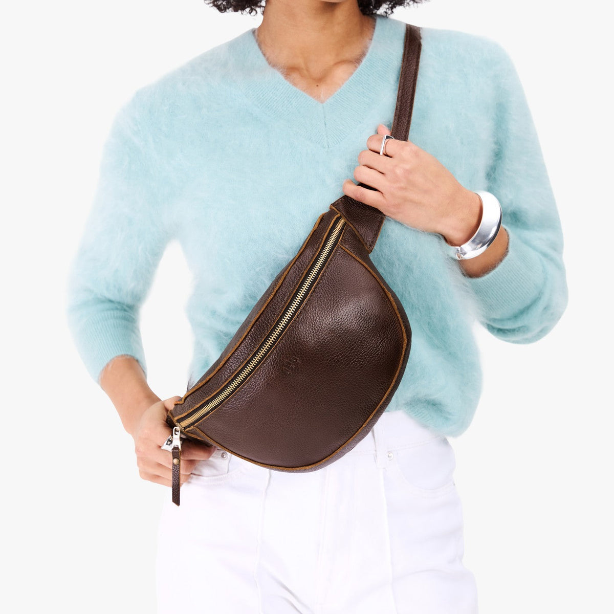 Coldbrew | Model wearing a sling bag with front zipper