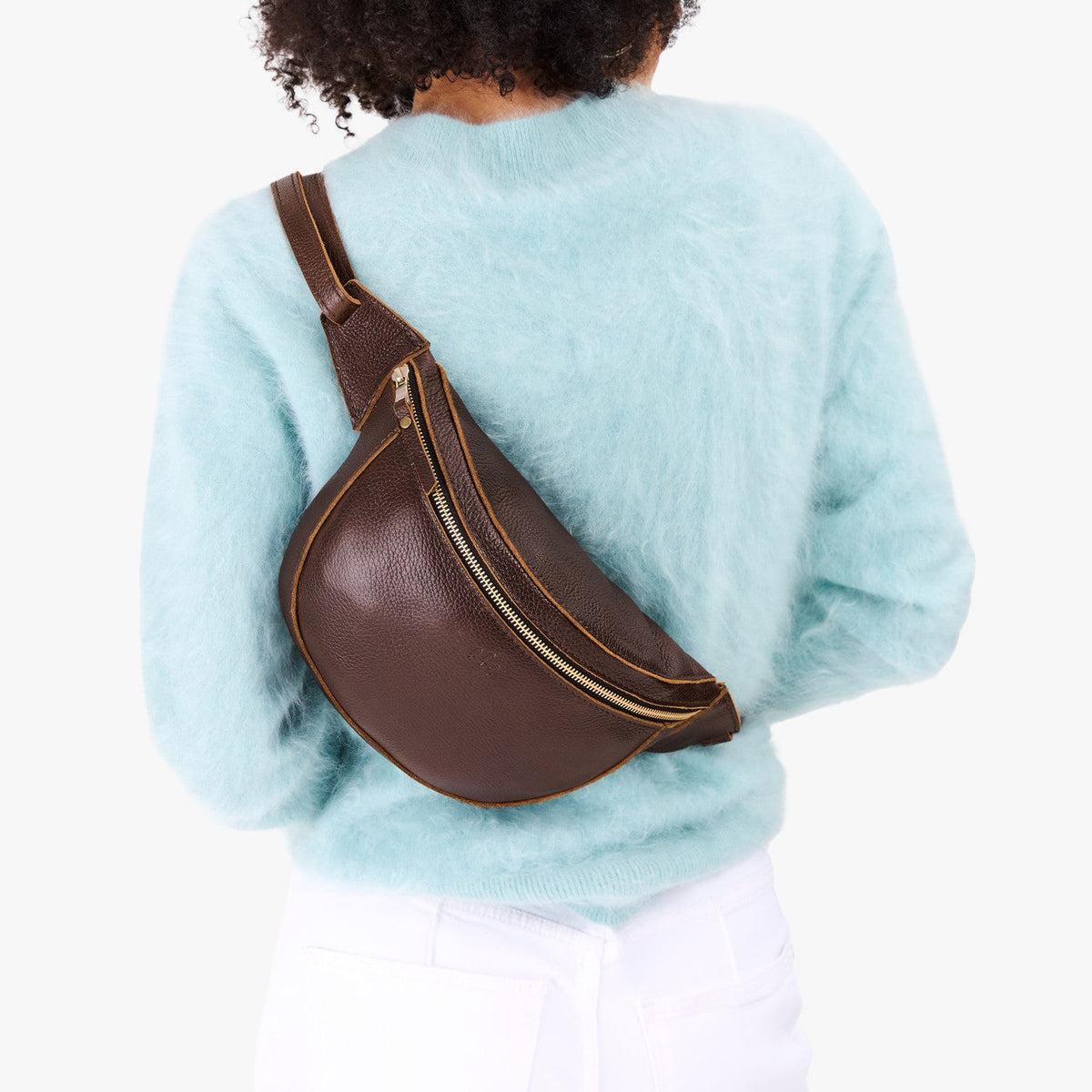 Coldbrew | Model wearing a sling bag with front zipper