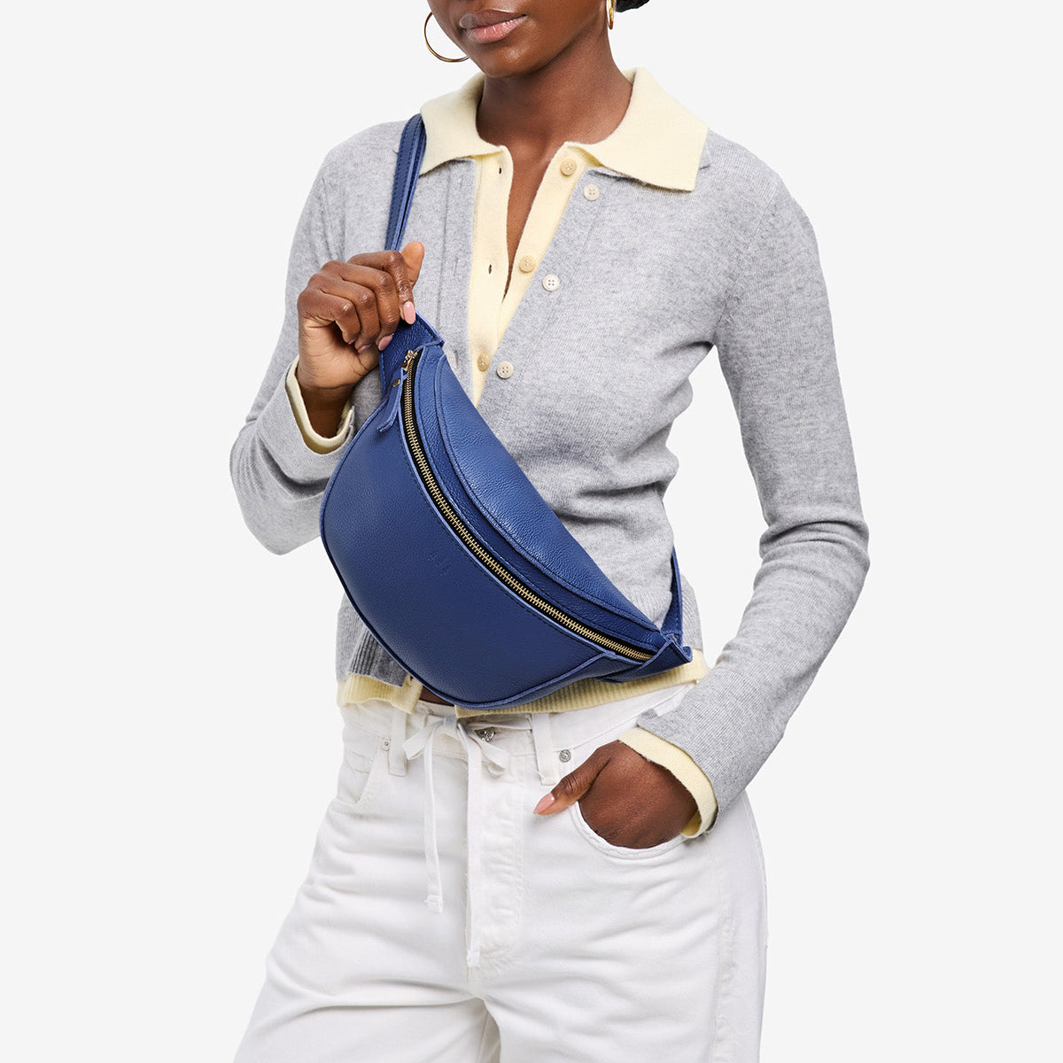 Molino Blue | Model wearing a sling bag with front zipper