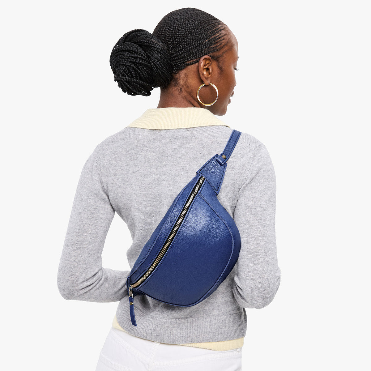Molino Blue | Model wearing a sling bag with front zipper