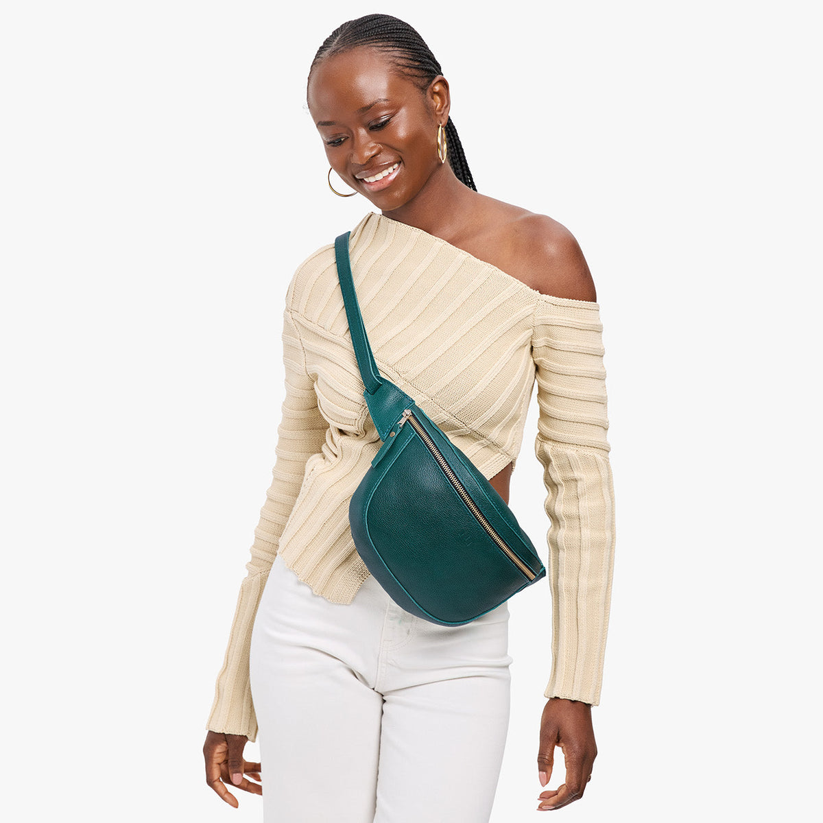 Sea Glass | Model wearing a sling bag with front zipper