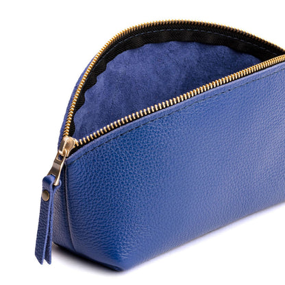 Molino Blue | Spacious leather makeup bag with curved seams and top zipper open