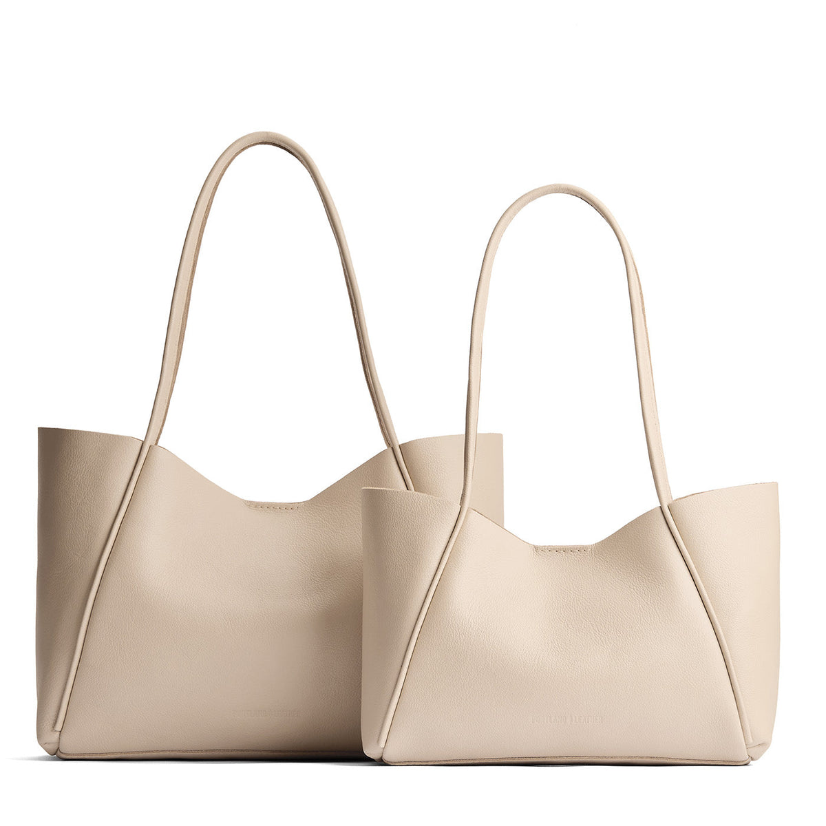 Pebbled Bone | Side by side comparison of both sizes of wide totes