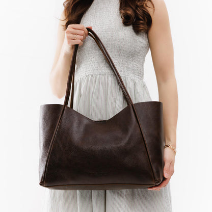 Coldbrew*Large | Model holding large rectangular tote bag