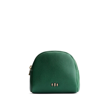 Bacalar | Curved top leather pouch with zipper opening, flat base, and three metal tree emblems in front