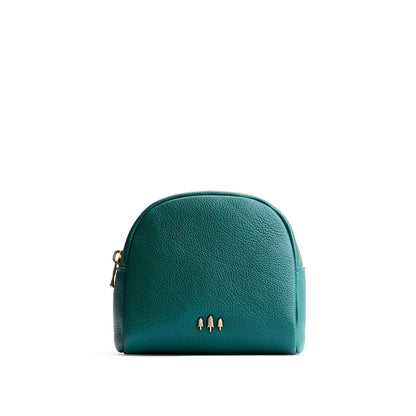 Sea Glass | Curved top leather pouch with zipper opening, flat base, and three metal tree emblems in front
