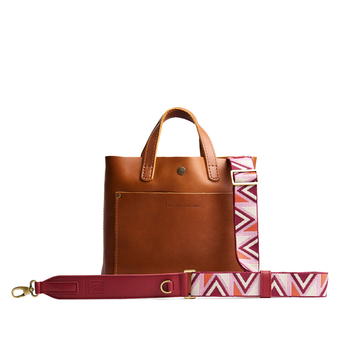 Pink Pony | Adjustable fabric and leather strap with zig zag pattern on a leather tote bag